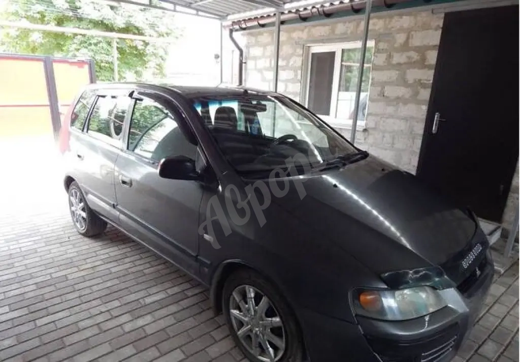 Автомобиль Mitsubishi Space Star 2004 года