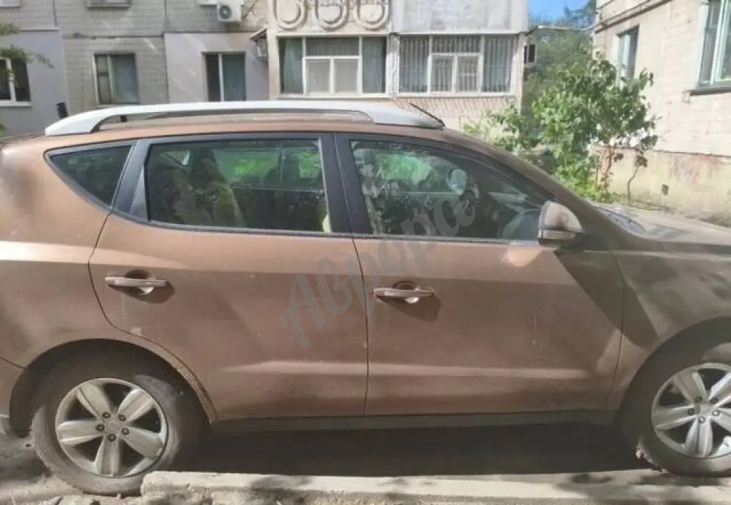 Автомобиль Geely Emgrand 2014 года